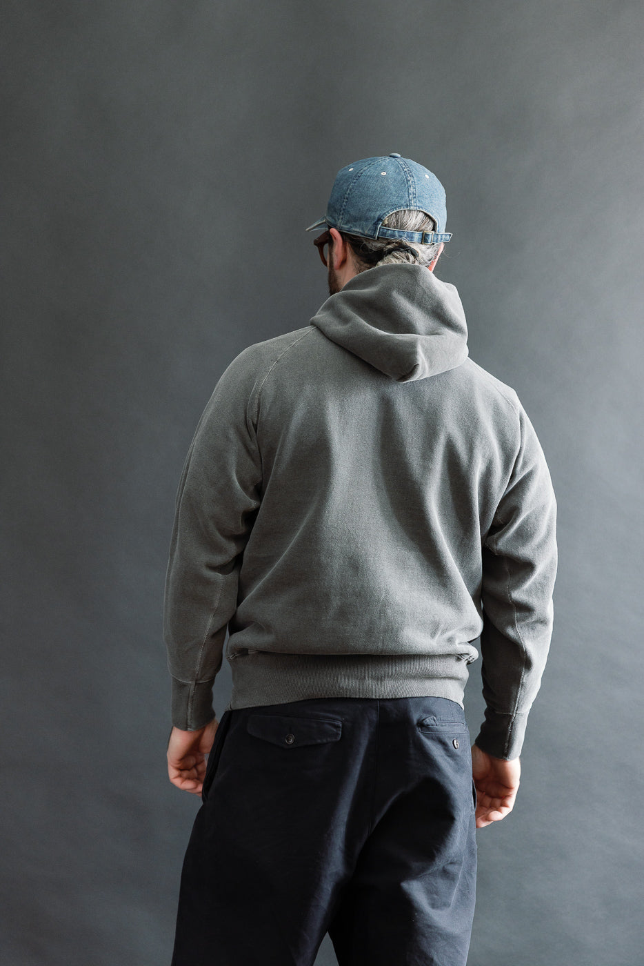Full body back view of male model 5'9