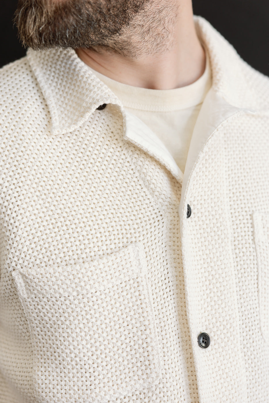 Close-up front of ecru cotton shirt on male model 5'9