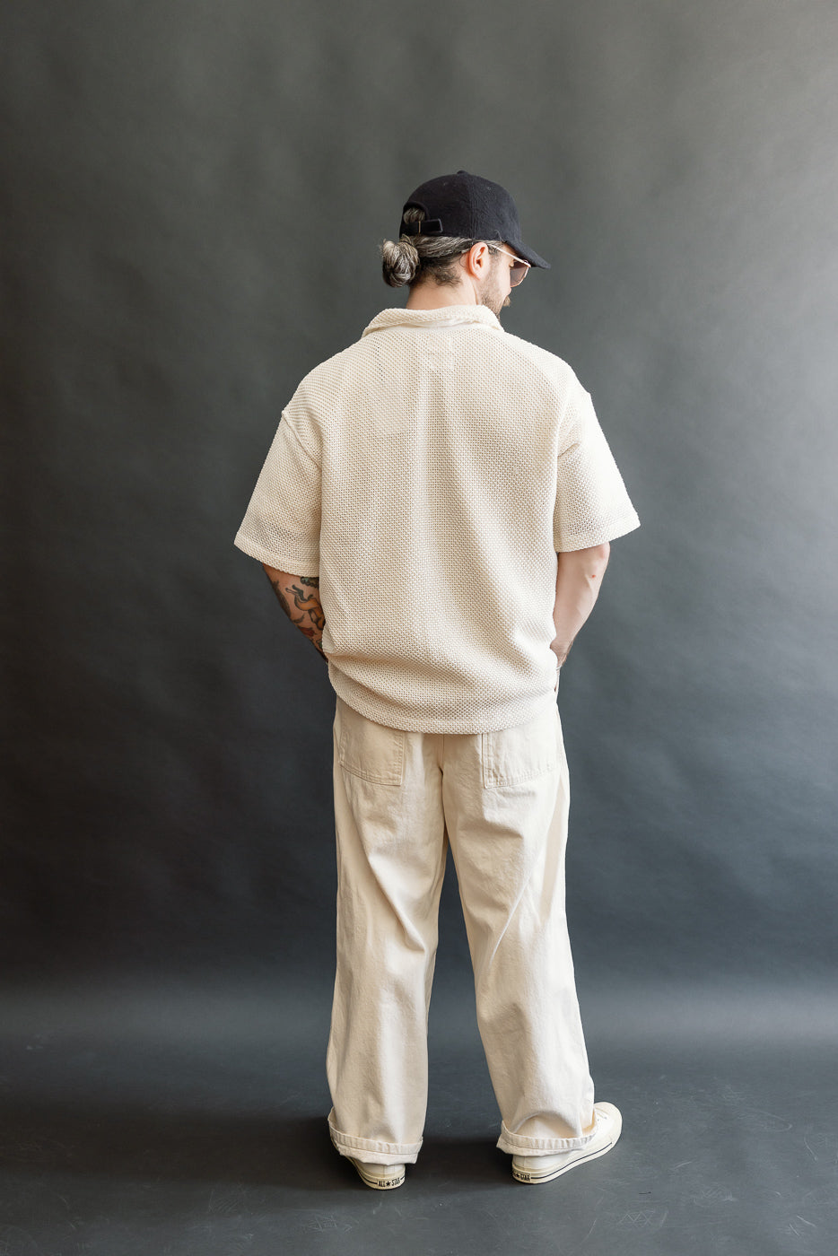 Full body back view of male model 5'9