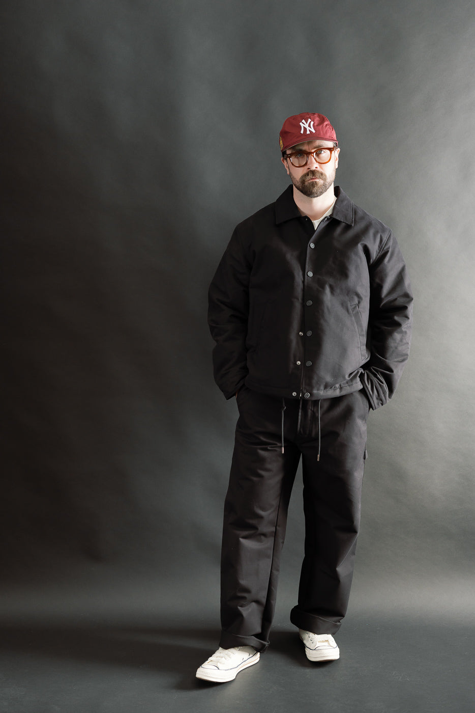 Full body front view of male model 5'9