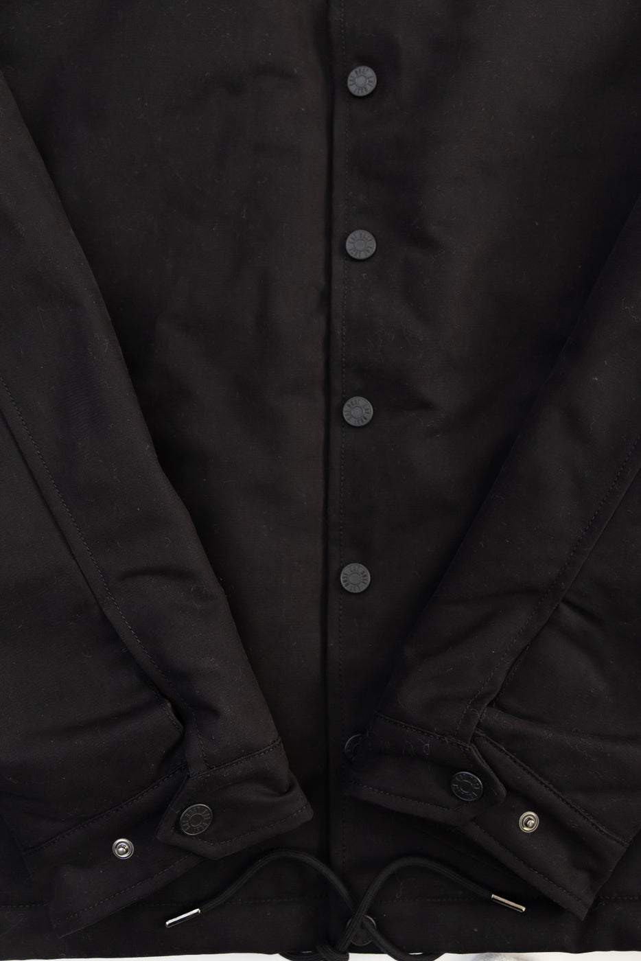 Close-up of front buttons, sleeves, and hem of Eat Dust Dago Nebraska Cotton Black Jacket