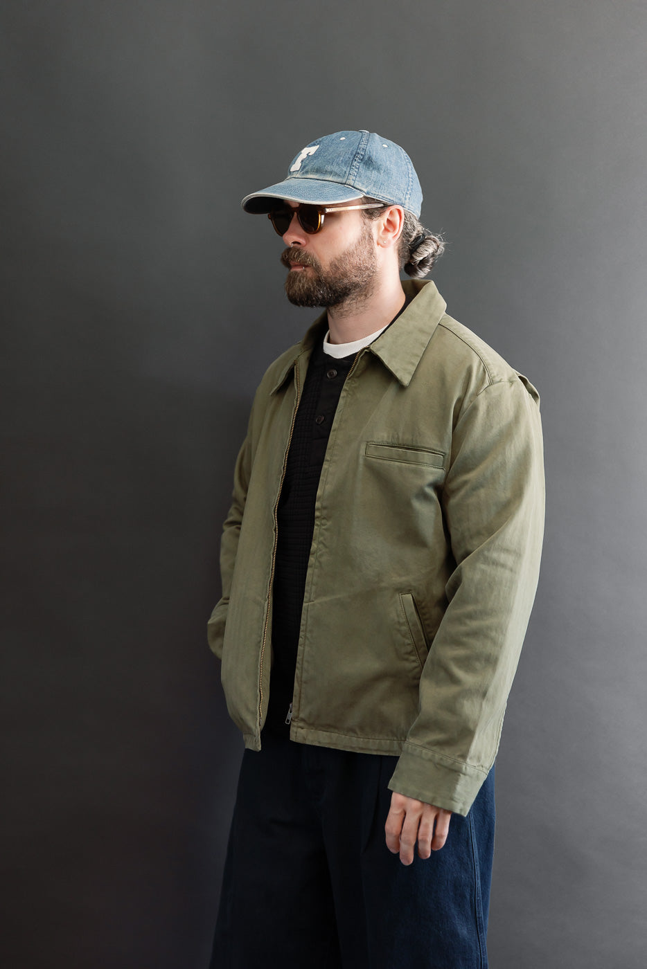 Full body side view of a male model, 5'9