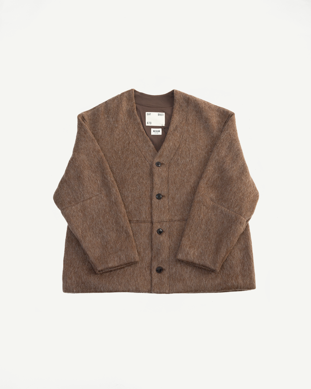 Flat lay front view of brown mohair fleece cardigan with black buttons and visible collar tags
