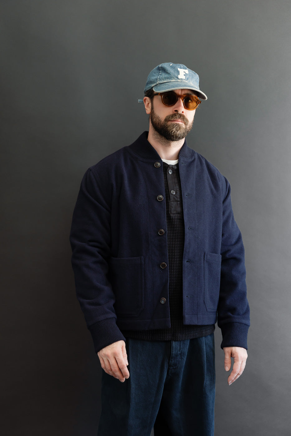 Full body front view of a male model, 5'9