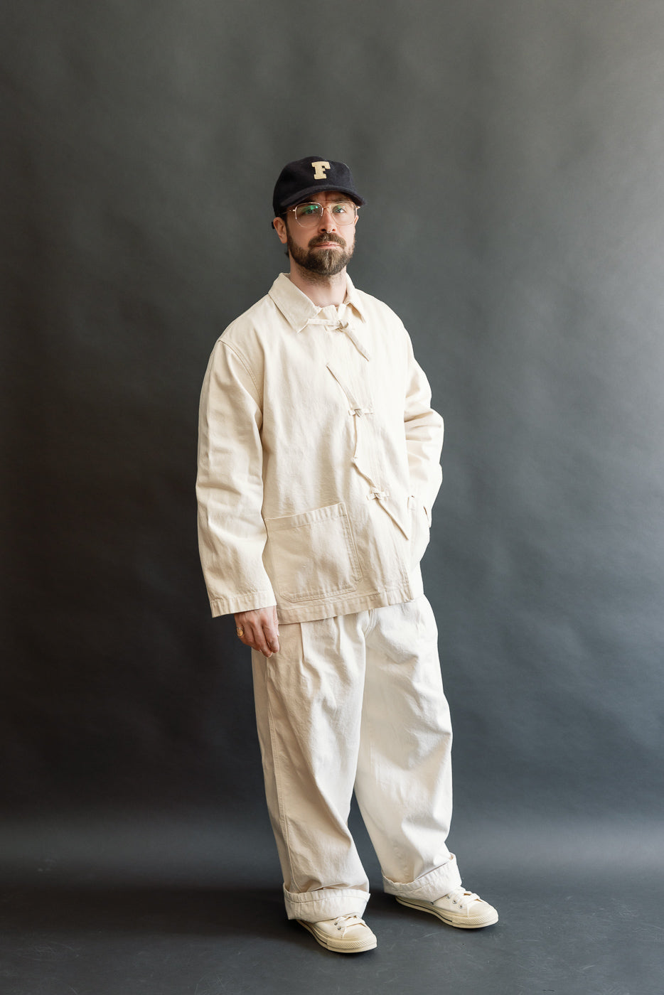 Full body front view of a male model, 5'9