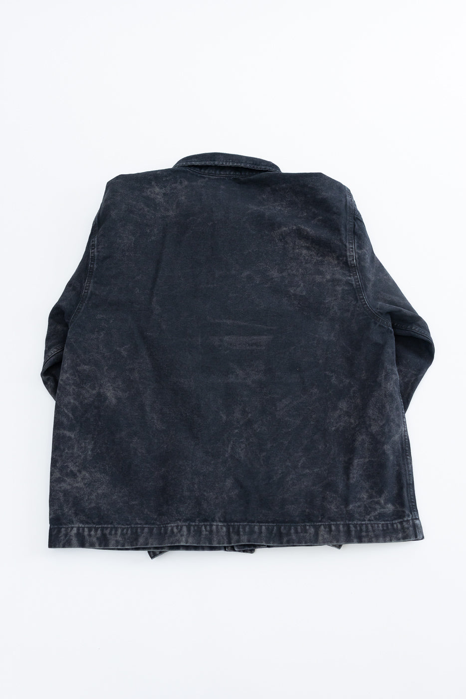 Flat lay back view of Arizona canvas jacket in asphalt, showing faded black fabric and hem stitching.