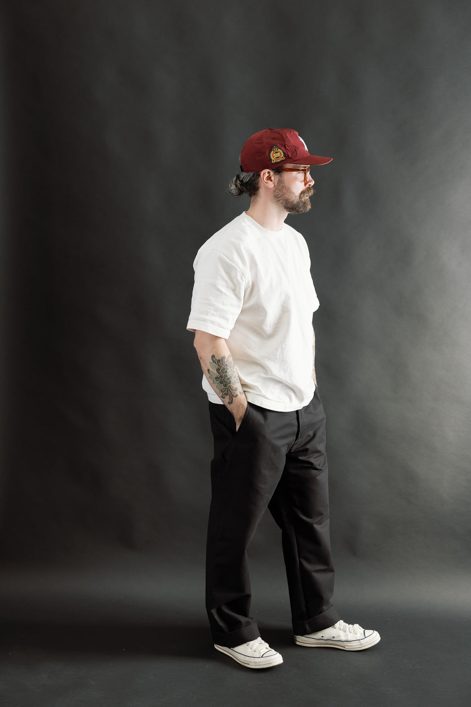 Full body side view of male model, 5'9