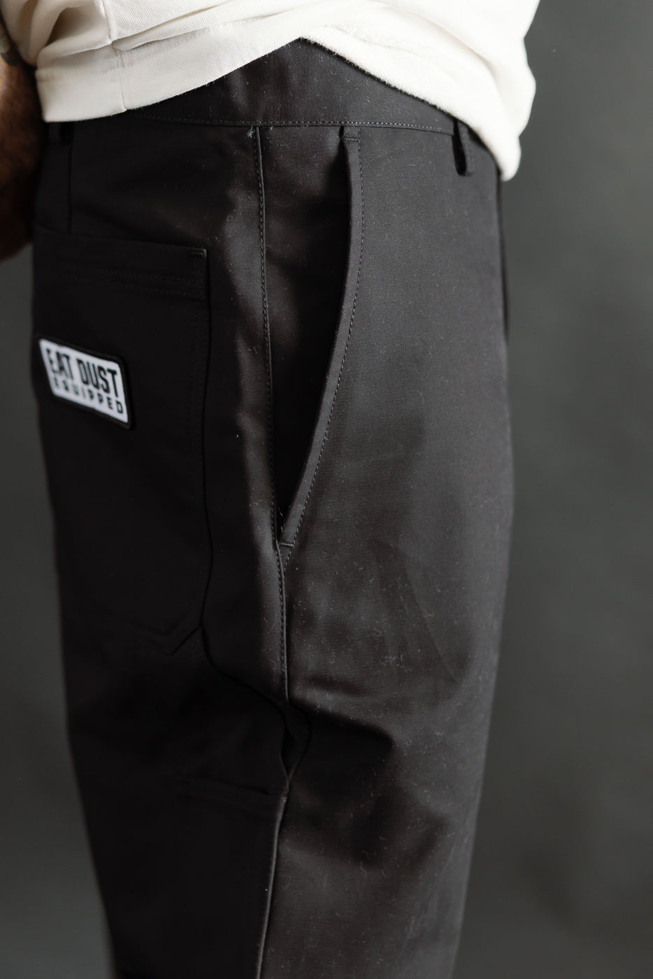 Close-up right side of black Oakland Chino pants on 5'9