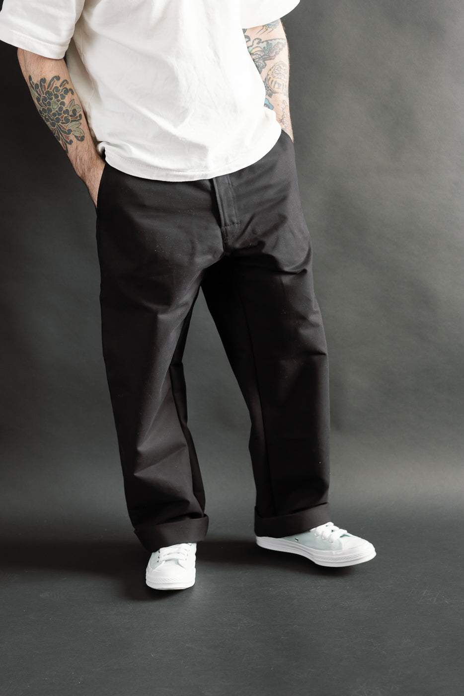 Front view, partial body shot of male model 5'9