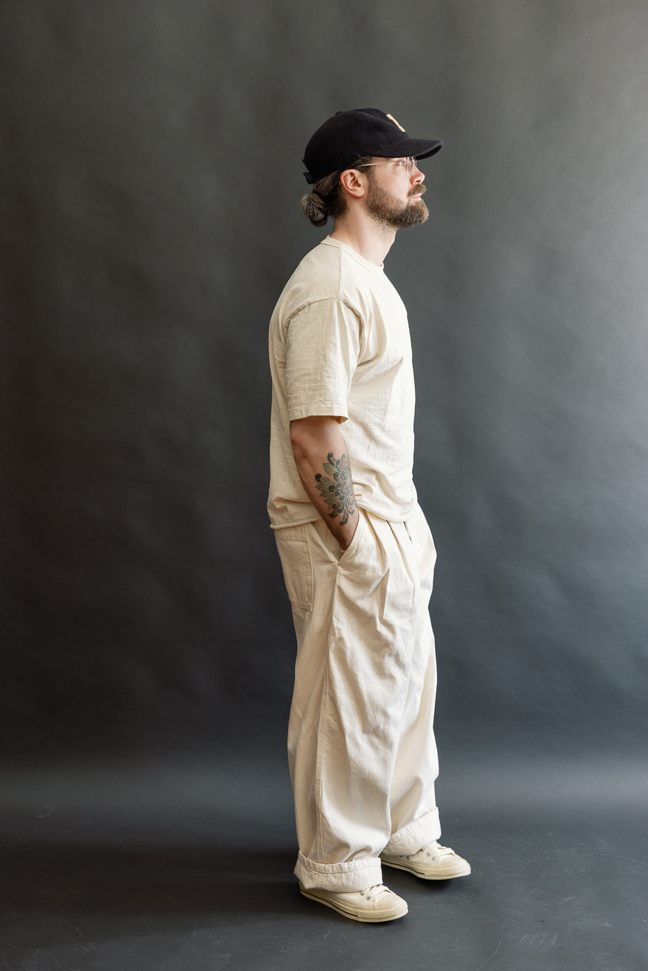 Full body side view of male model, 5'9