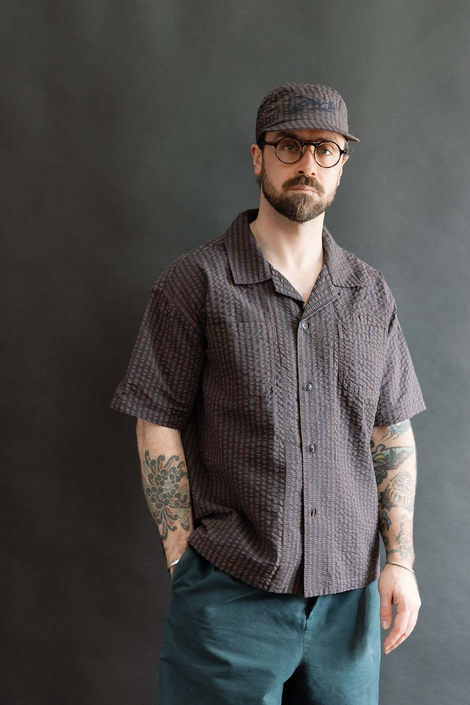 Front, half body view of male model 5'9