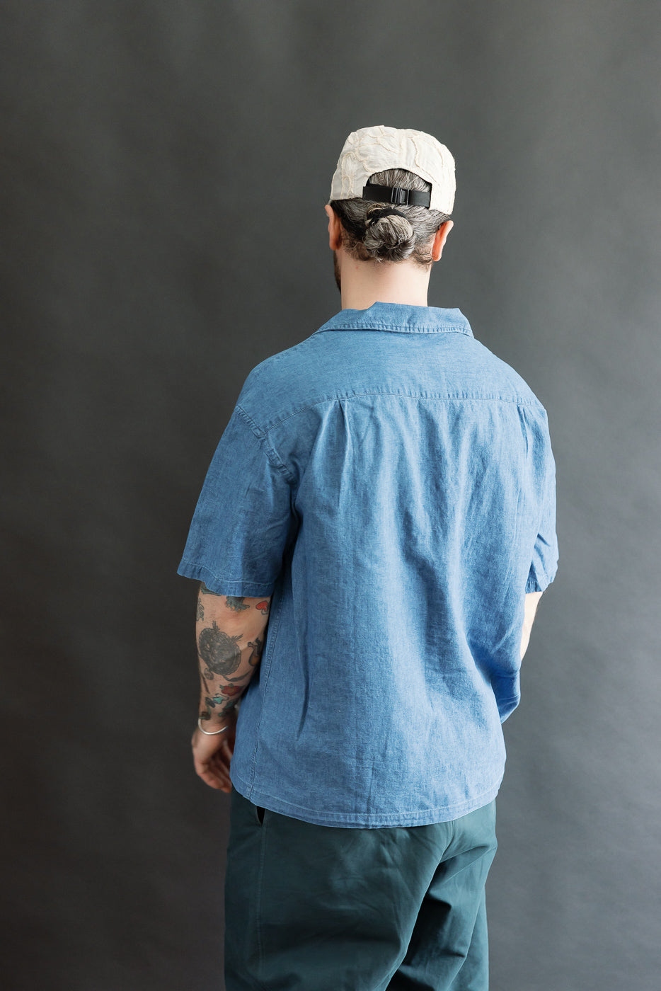 Back view, full body of male model 5'9