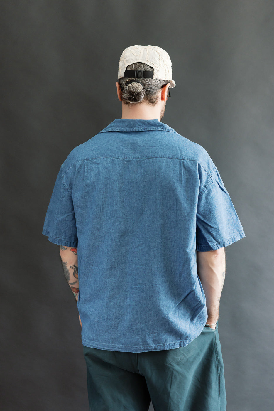 Full body back view of a male model, 5'9