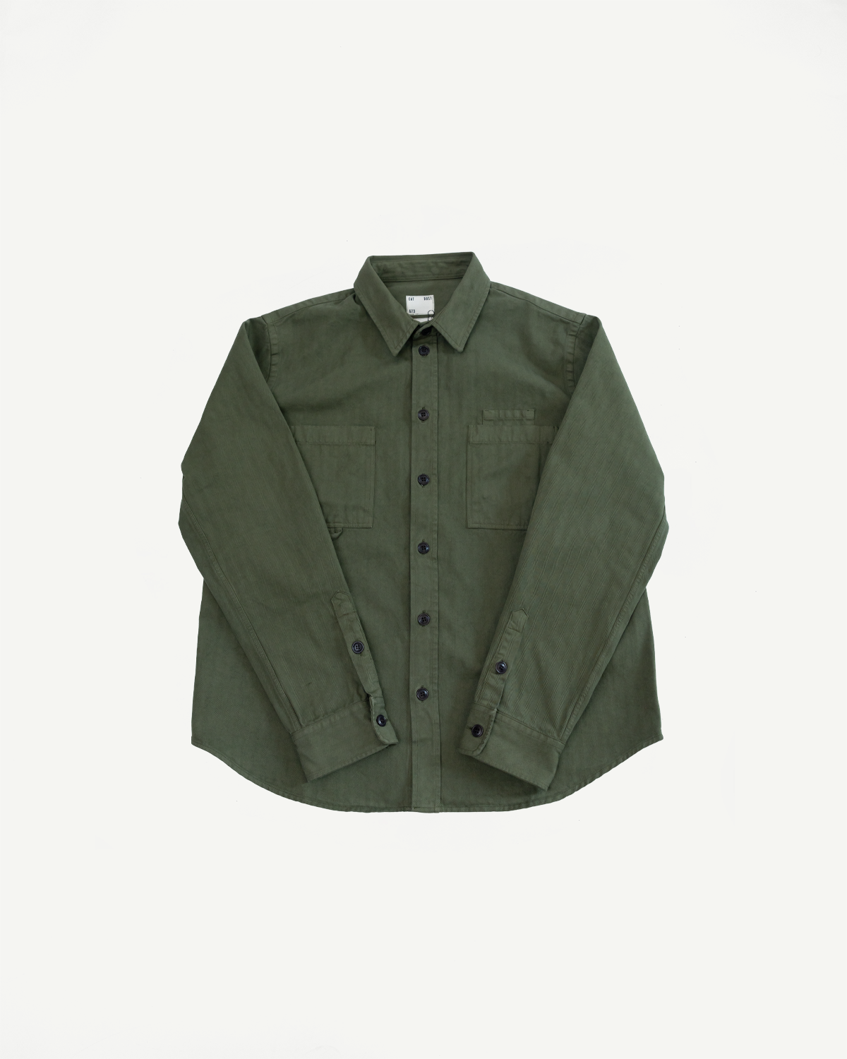 Flat lay front view of an olive green long sleeve button-down shirt with chest pockets.