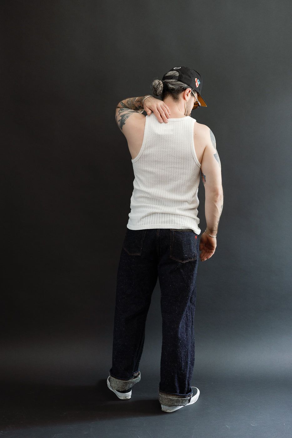 Full body back view of male model 5'9
