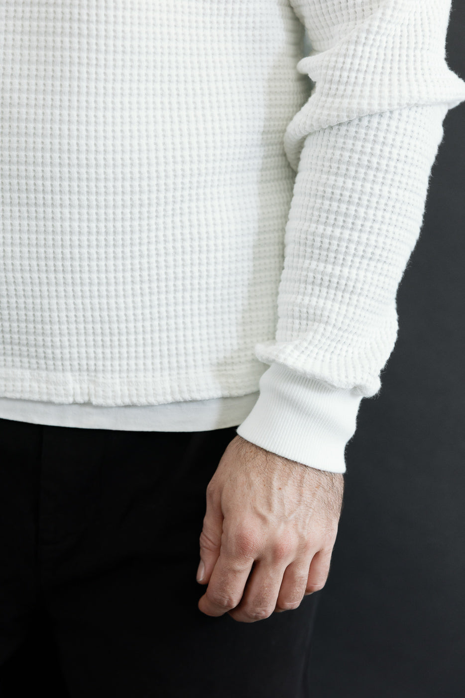 Close-up side view of a male model (5'9