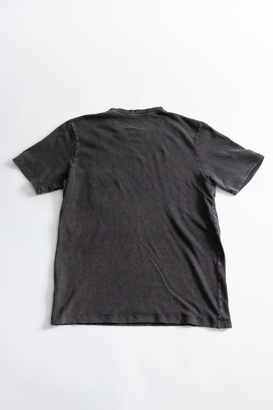 Flat lay of cotton hemp vintage black t-shirt showing full back, short sleeves, no model