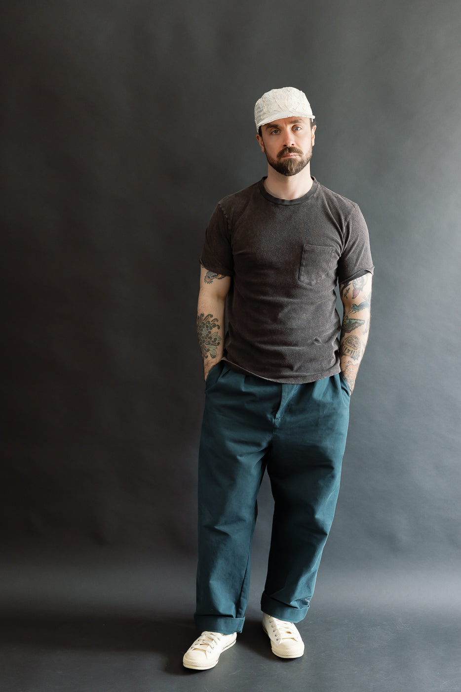 Full body front view of a male model, 5'9