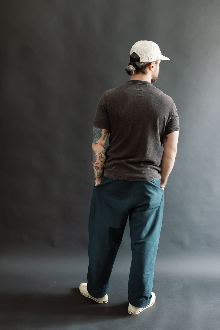 Full body back view of male model 5'9