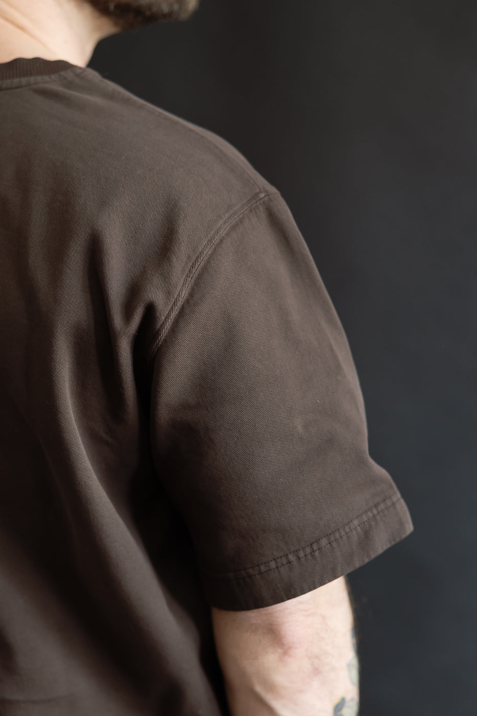 Close-up of male model's right side, 5'9