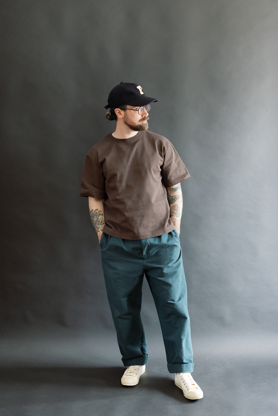 Full body front view of male model 5'9