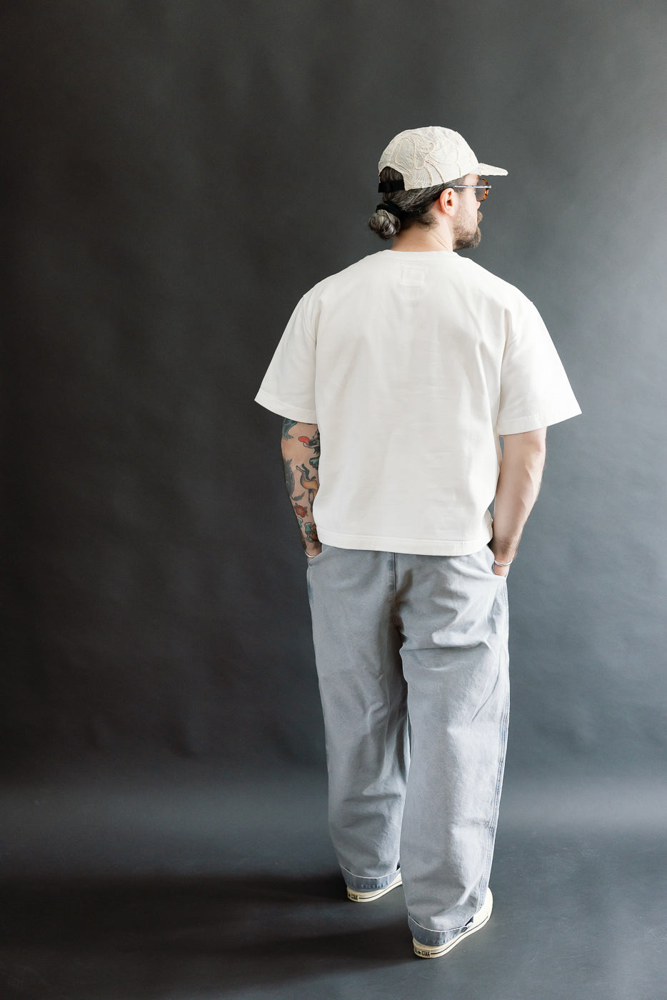 Full body rear view of male model 5'9