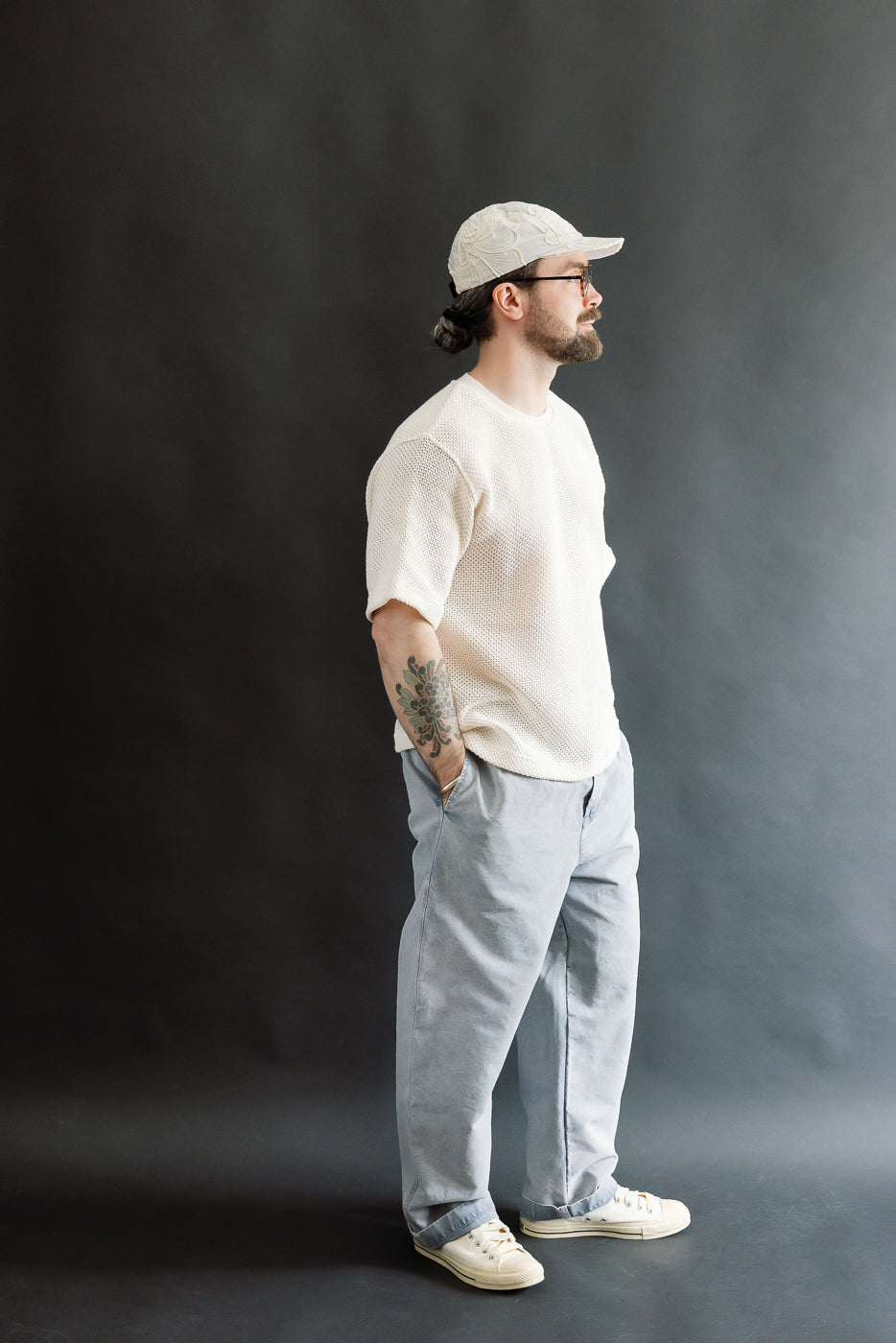 Full body side view of male model 5'9