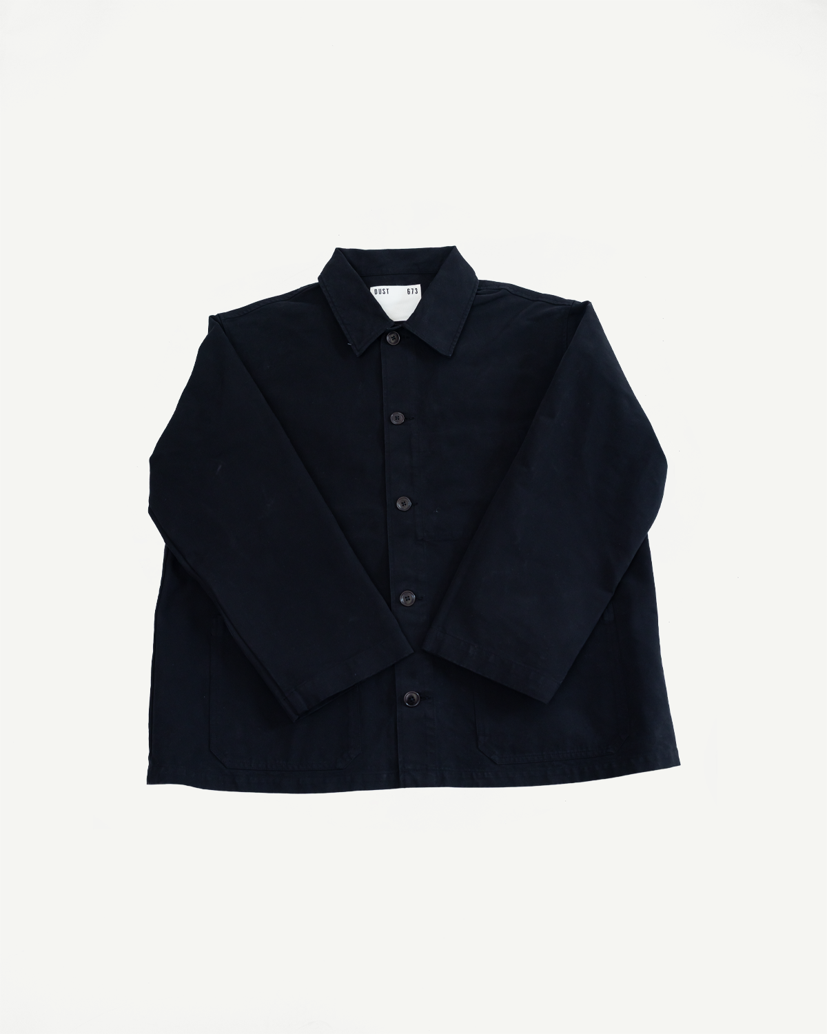 Front view flat lay of a black long-sleeve button-up shirt showing the collar and buttons.