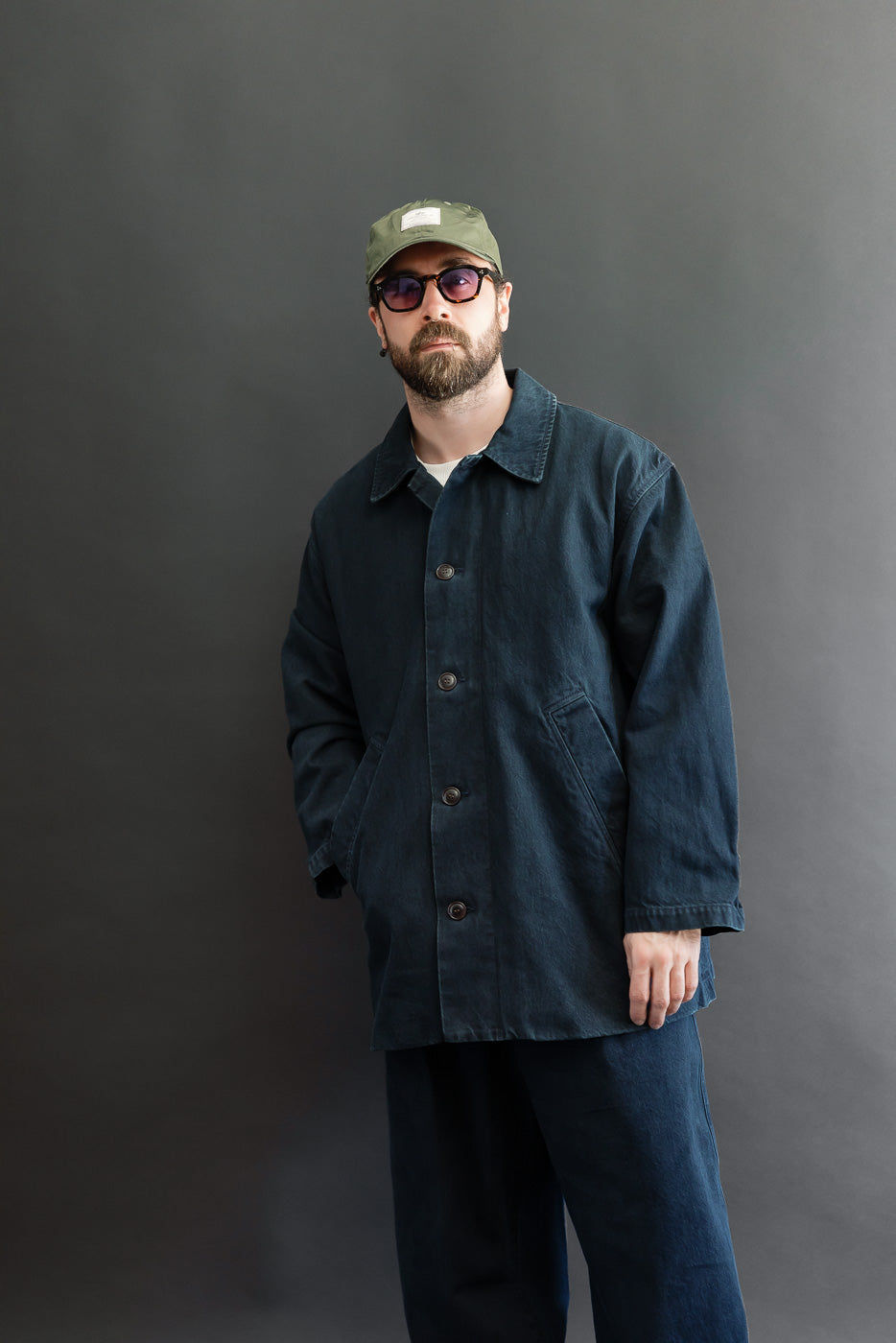 Full body front view of a male model, 5'9