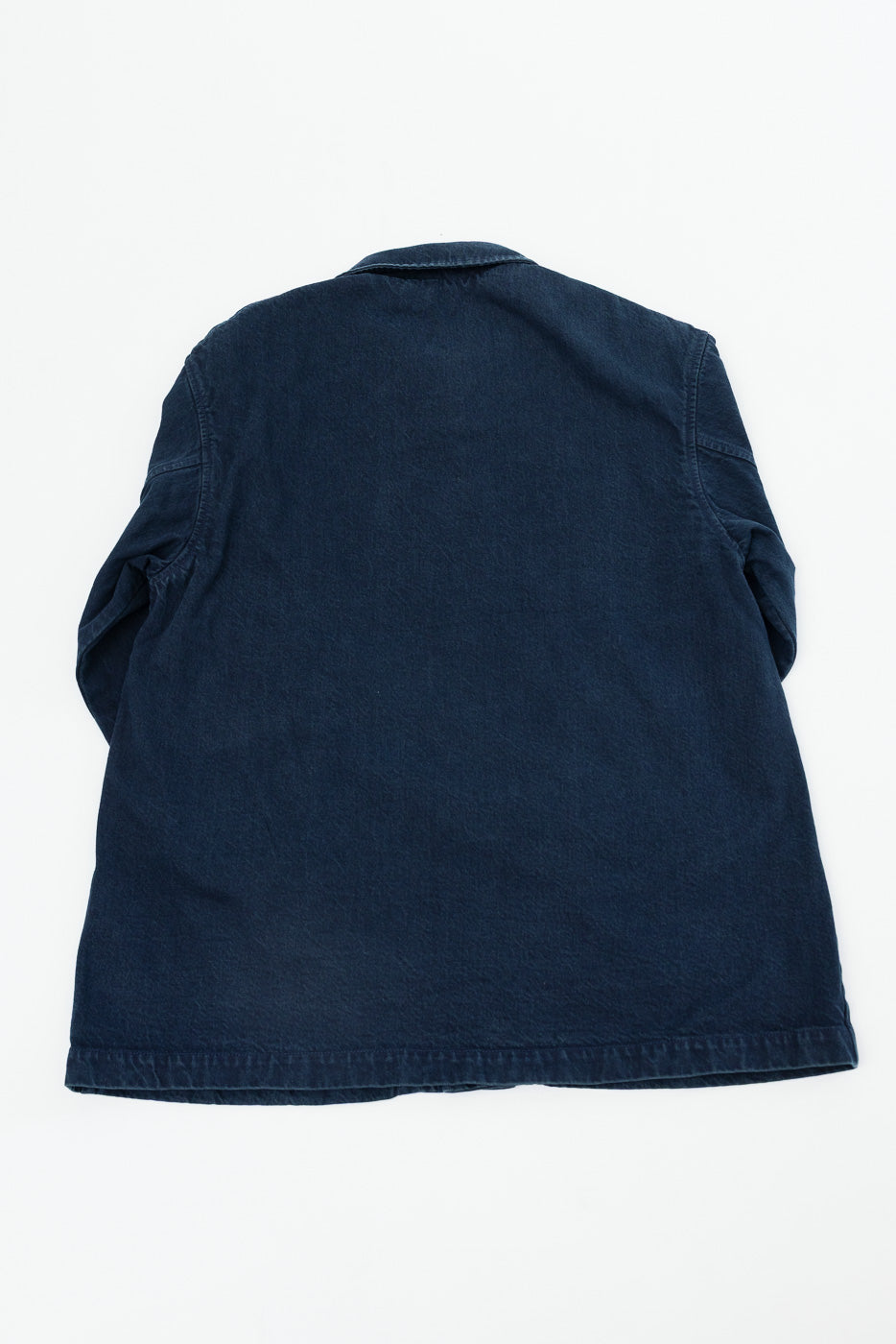 Back view flat lay of a dark navy blue jacket.