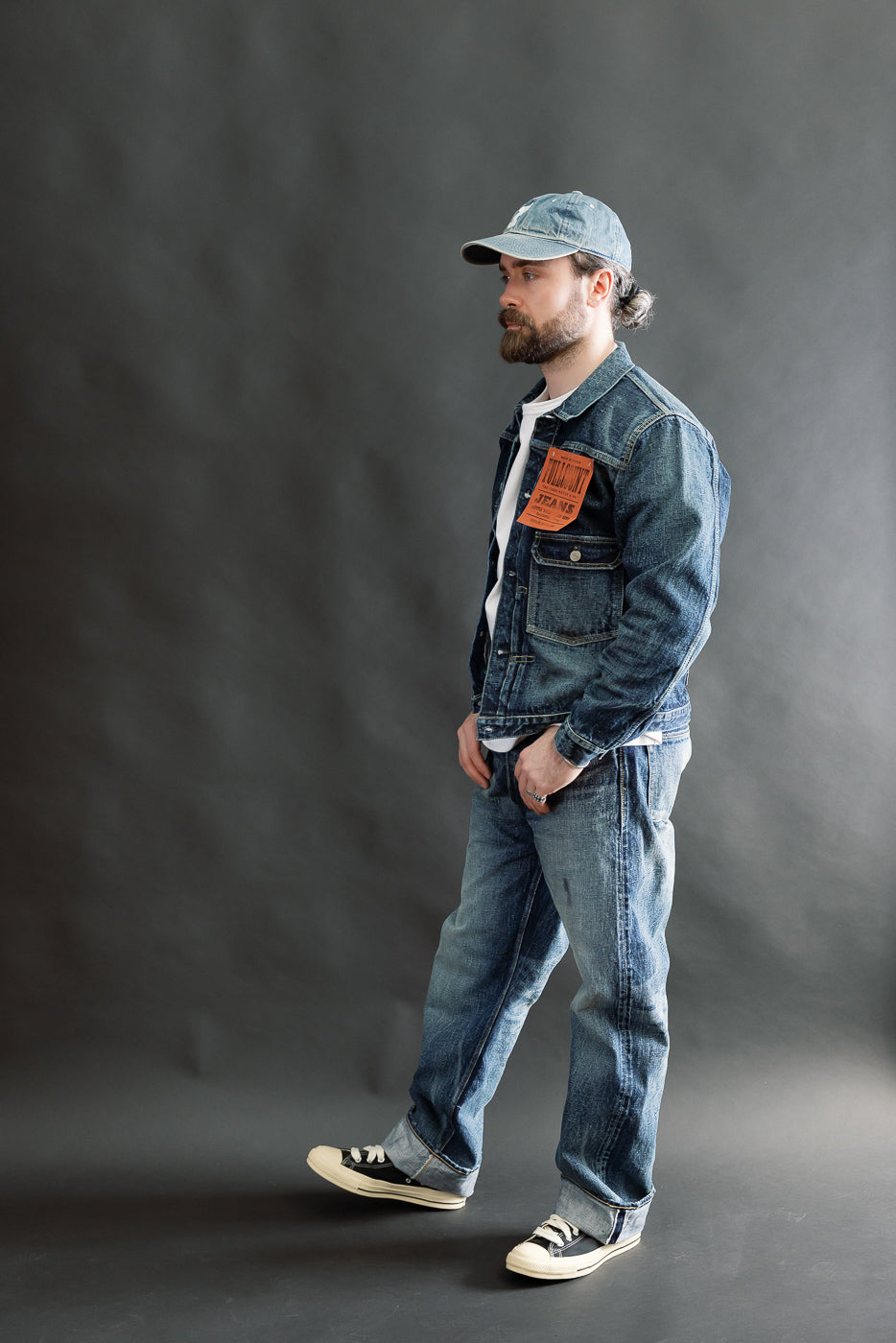 Full body side view of male model 5'9
