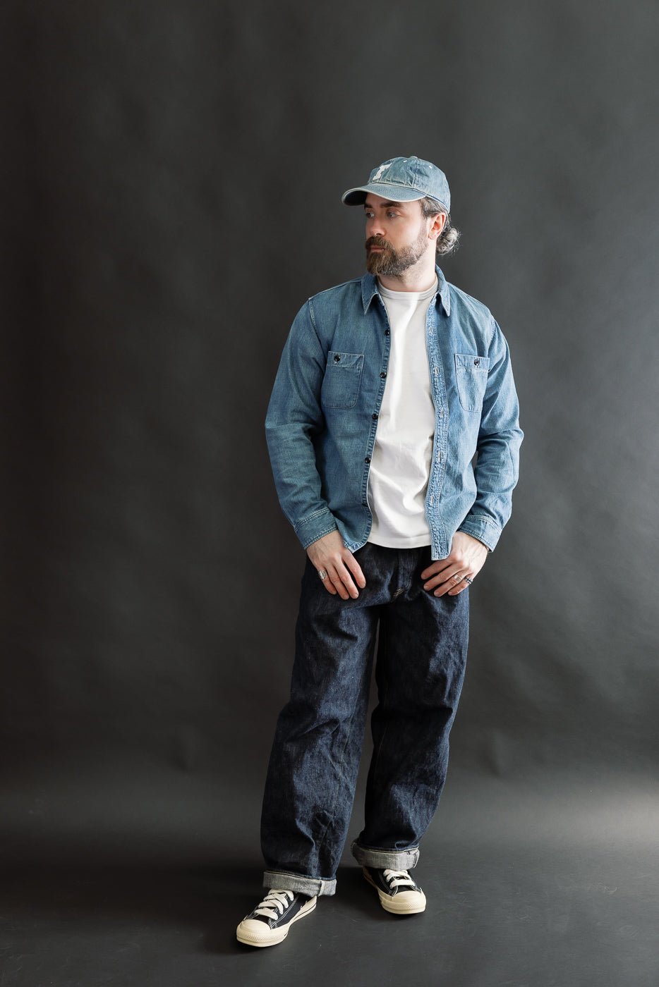 Full body view of a male model, 5'9