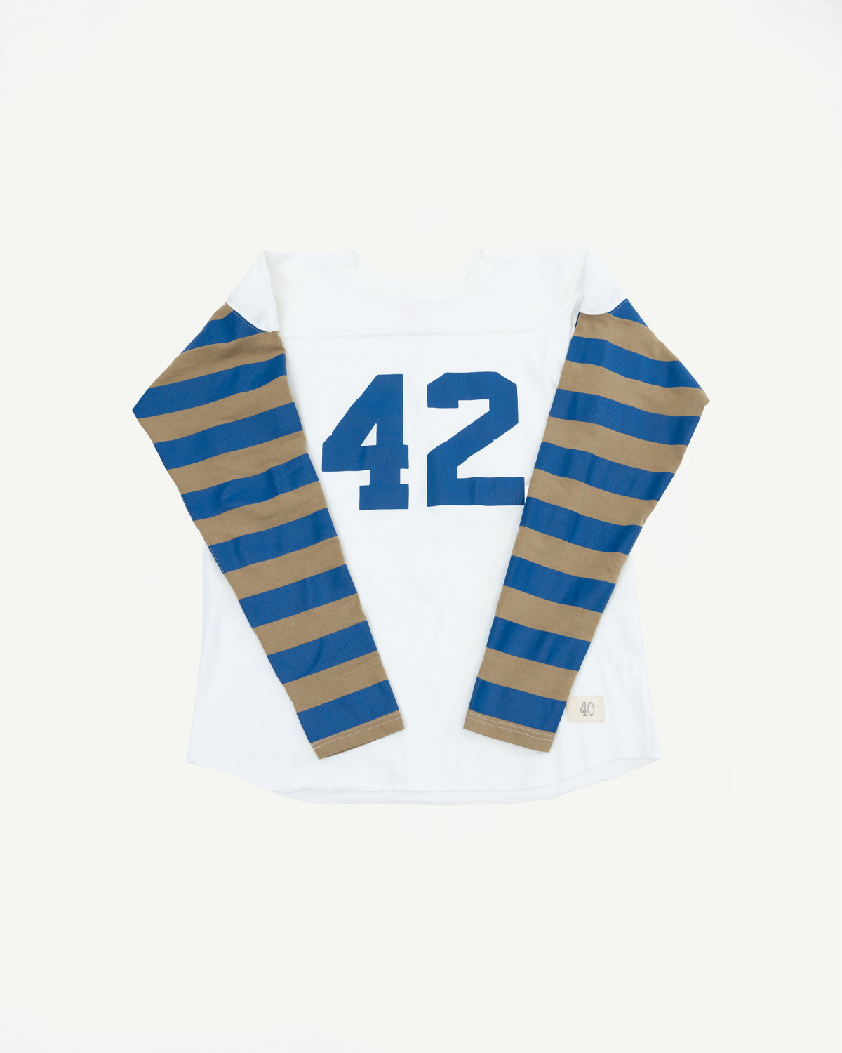 Flat lay front view: white long-sleeve shirt with blue '42', striped blue/tan sleeves, size 40 tag