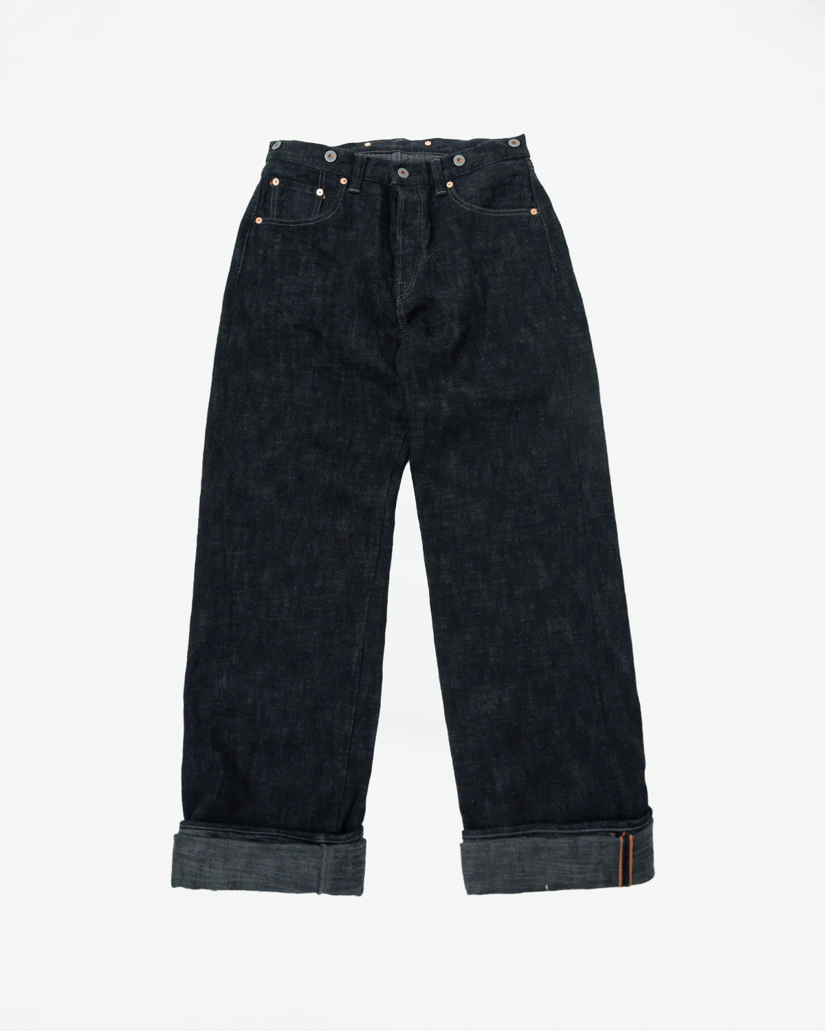 Flat lay front view of Graph Zero 15oz black selvedge denim jeans with cuffed hem, Dant