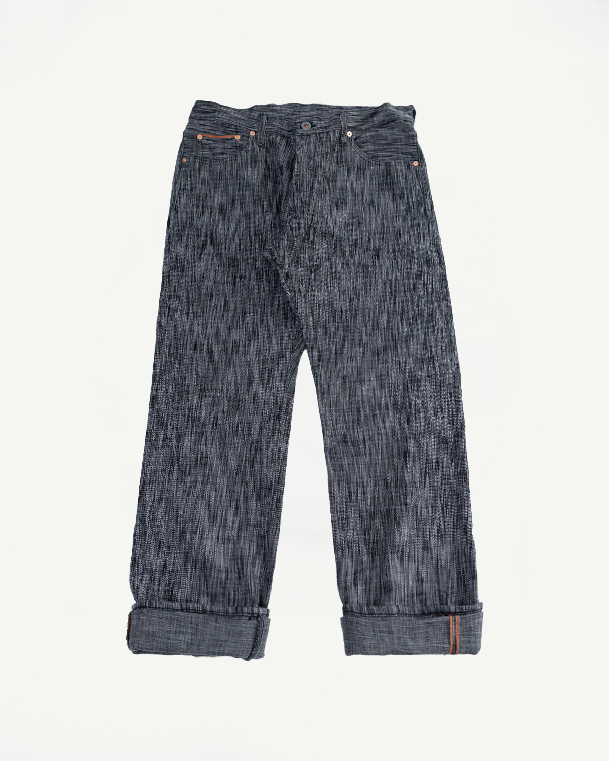 Front view of selvedge jeans with cuffed hems, copper rivets, and textured fabric