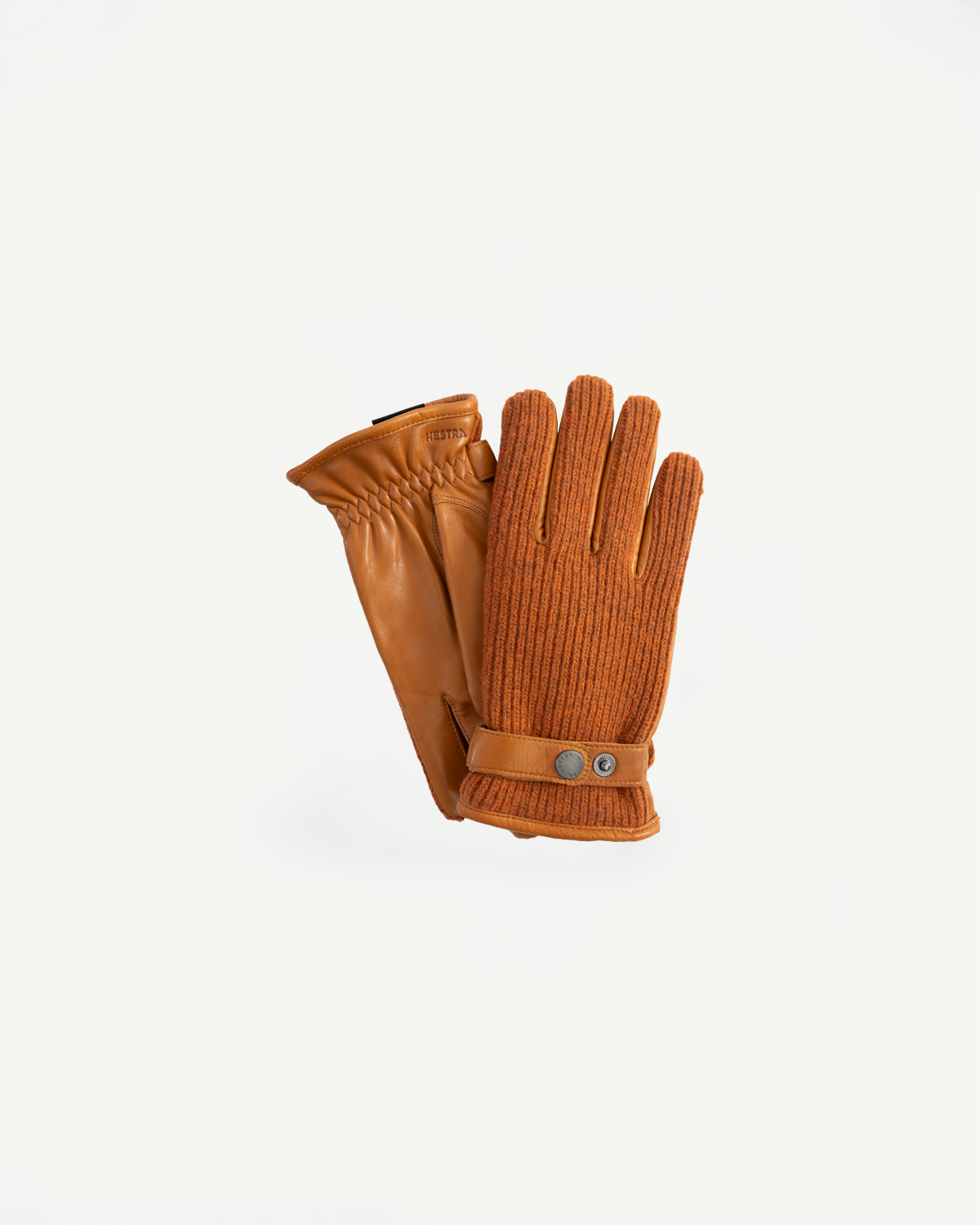 Flat lay of Hestra Christopher cork gloves, full front and back, ribbed knit and leather detail