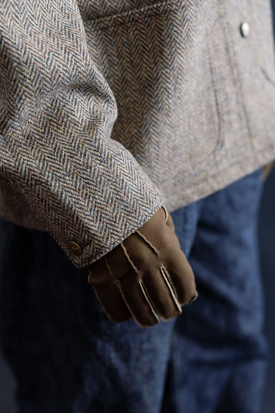 Close-up of Hestra Damien glove in loden on male model, 5'9