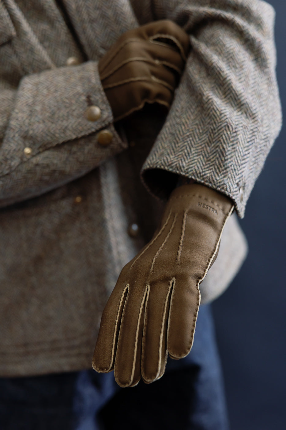 Close-up of Hestra Damien loden glove on male model, 5'9