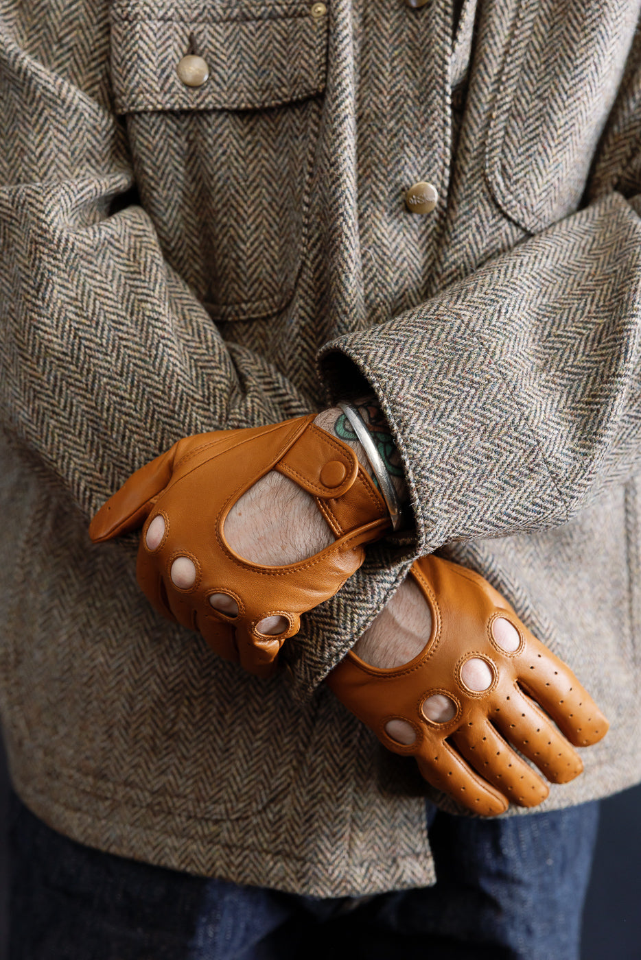 Close-up of Hestra Morgan cork driving gloves on male model 5'9 165lbs, front hand detail