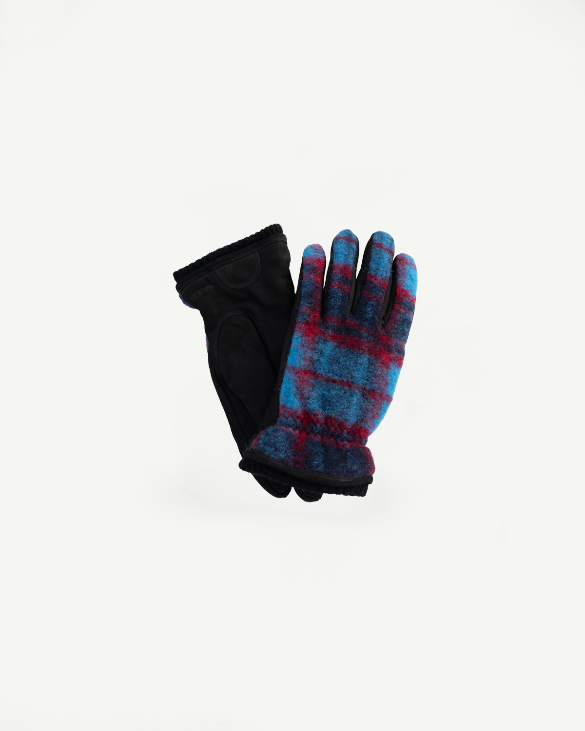 Flat lay of Hestra Noah plaid glove, palm and back views, blue and red wool, Dant accessories