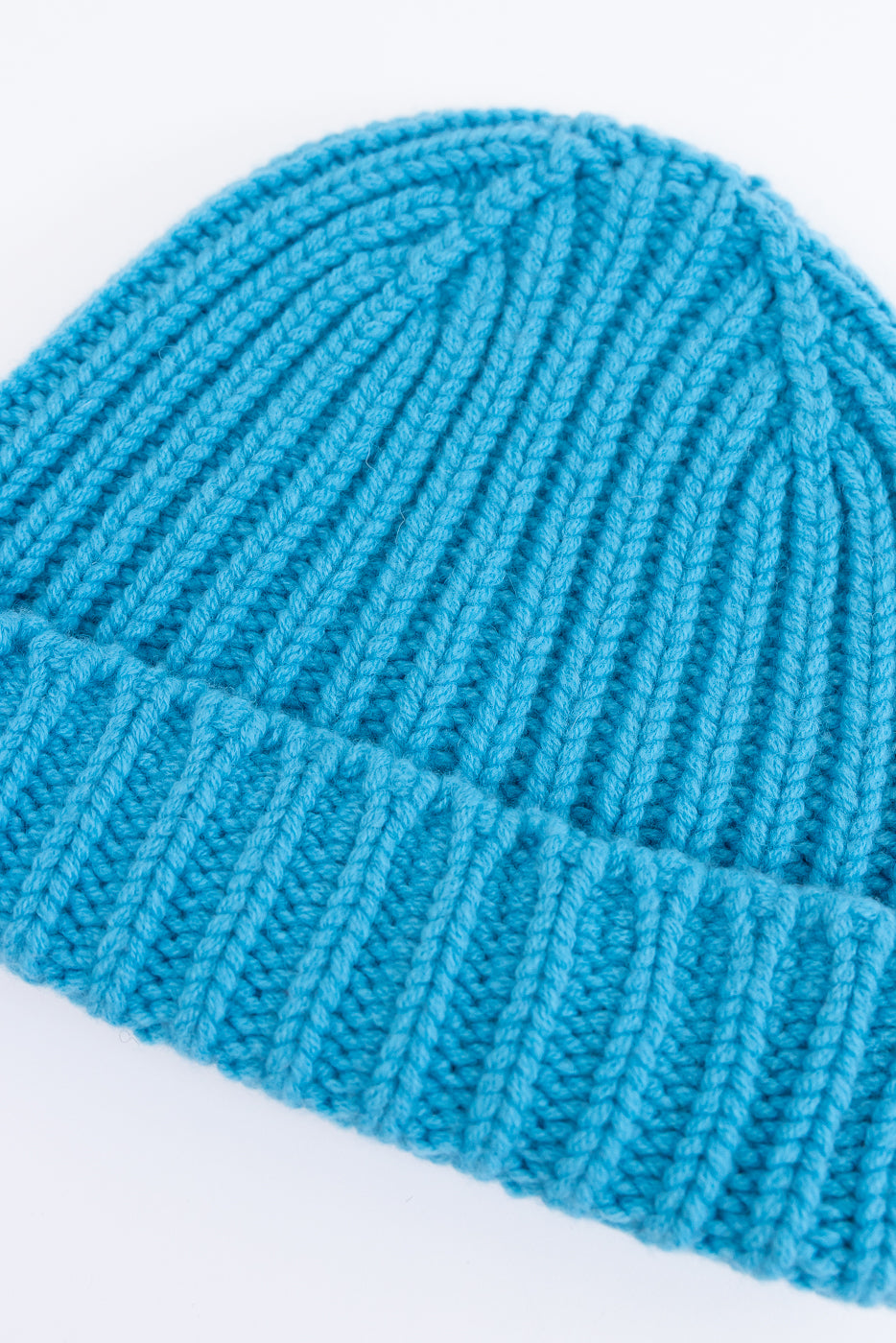 aquamarine ribbed chunky beanie, watch cap on white background, close up