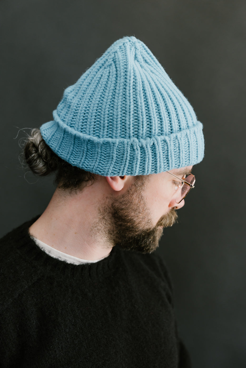 aquamarine ribbed chunky beanie, watch cap on a bearded man, side view