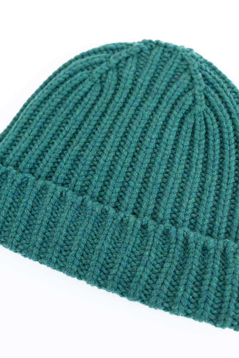 close up of green mix ribbed chunky beanie, watch cap on white background