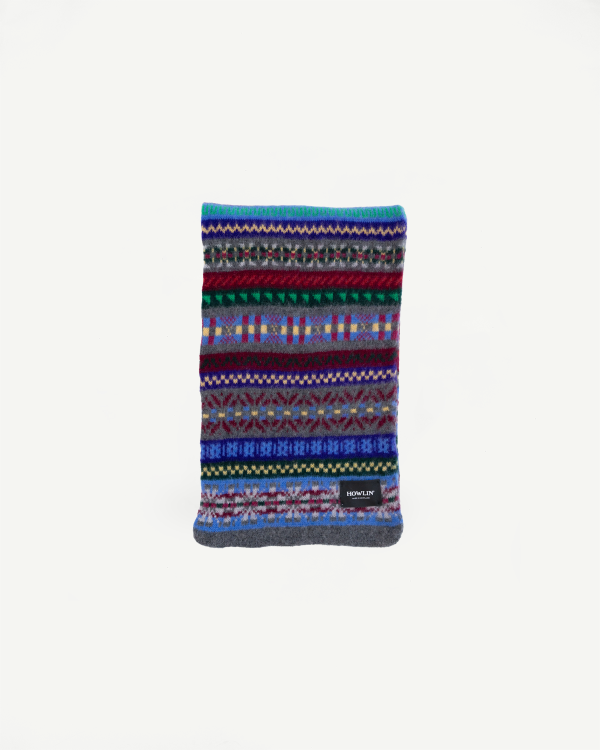 multicolored, patterned wool scarf with a heather grey base on a white background