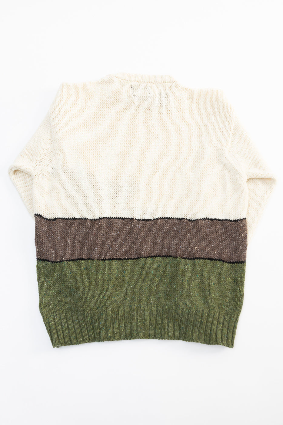 Back view flat lay of colorblock knit sweater in ecru, brown, and olive green from Dant