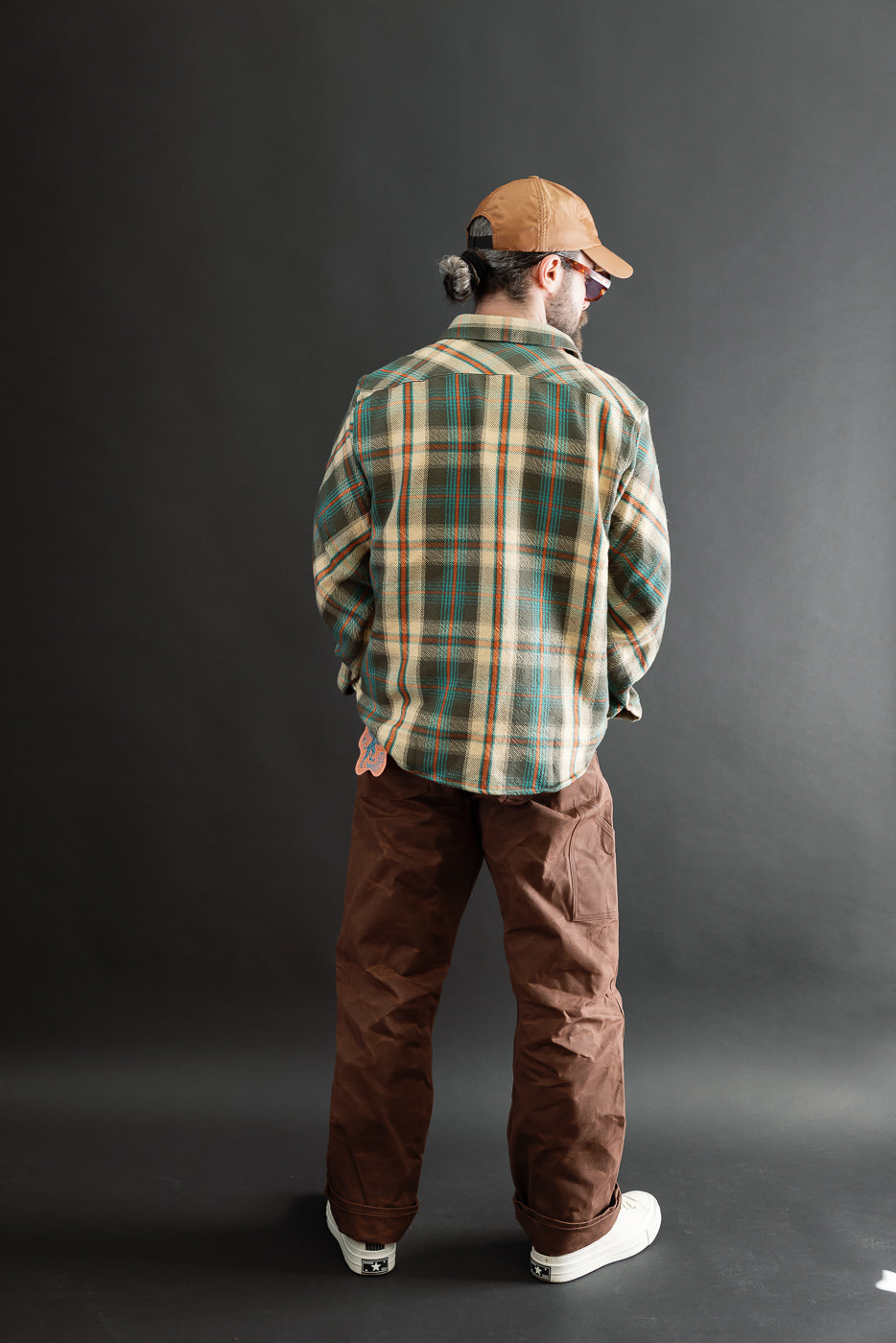 Back view of full body shot: male model, 5'9