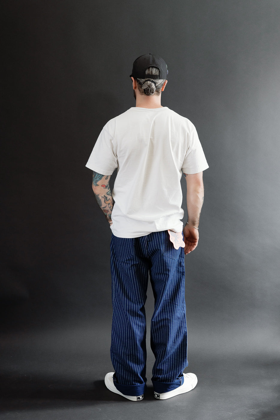 Full body back view of a male model, 5'9