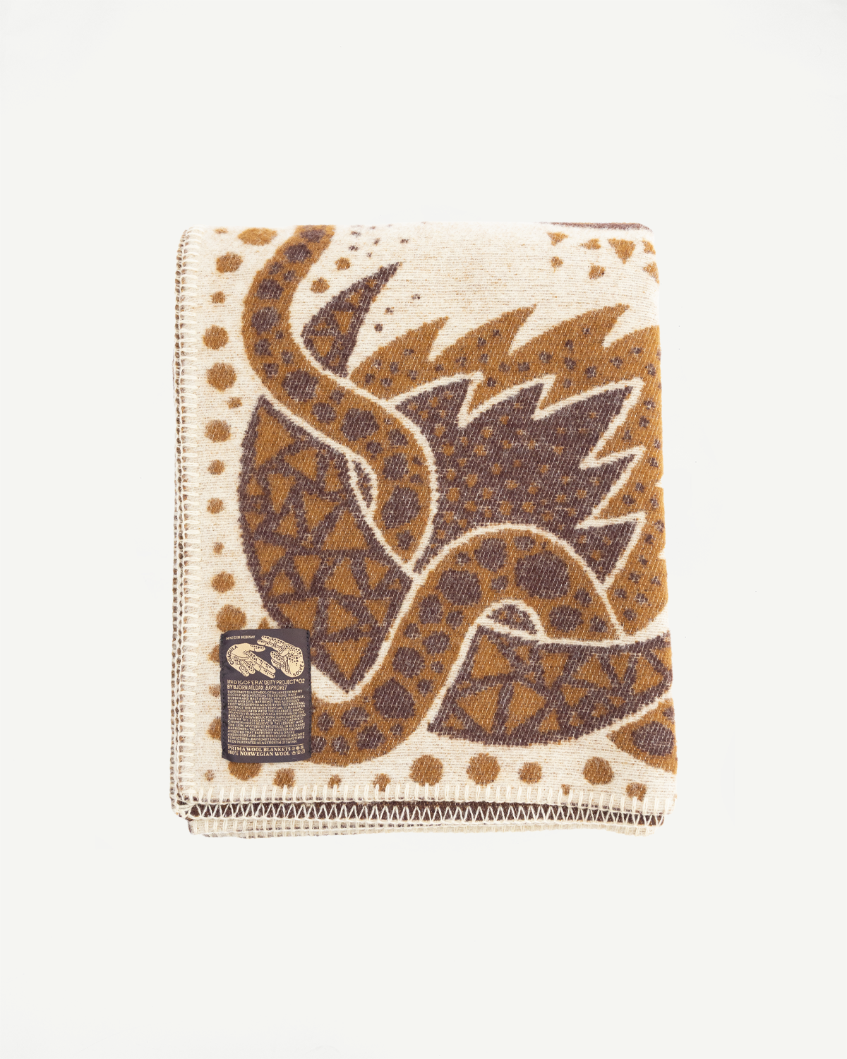 folded brown and beige blanket on a white background with custom artwork tag in lower left corner