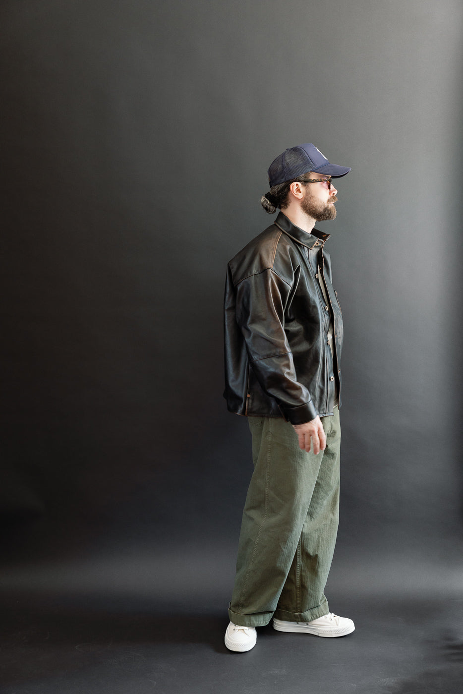 Full body side profile of a male model, 5'9