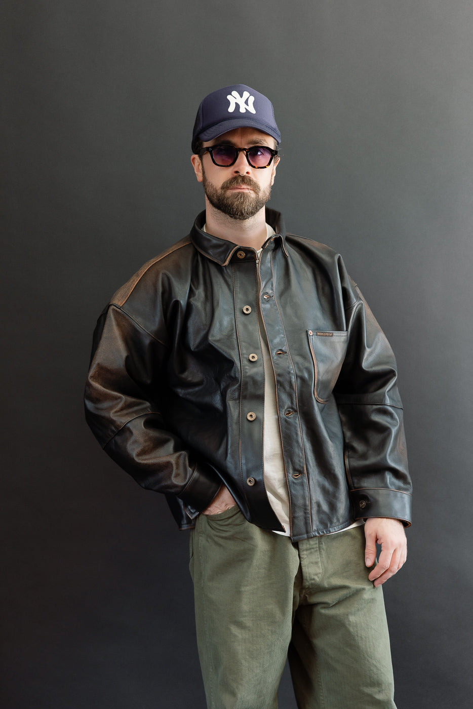 Full body front view of a male model, 5'9